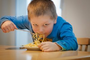 Boy with pasta
